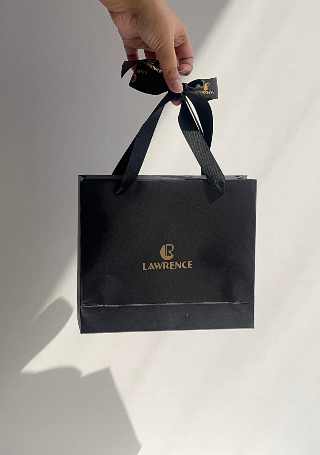 Gift (includes one bag with ribbon)