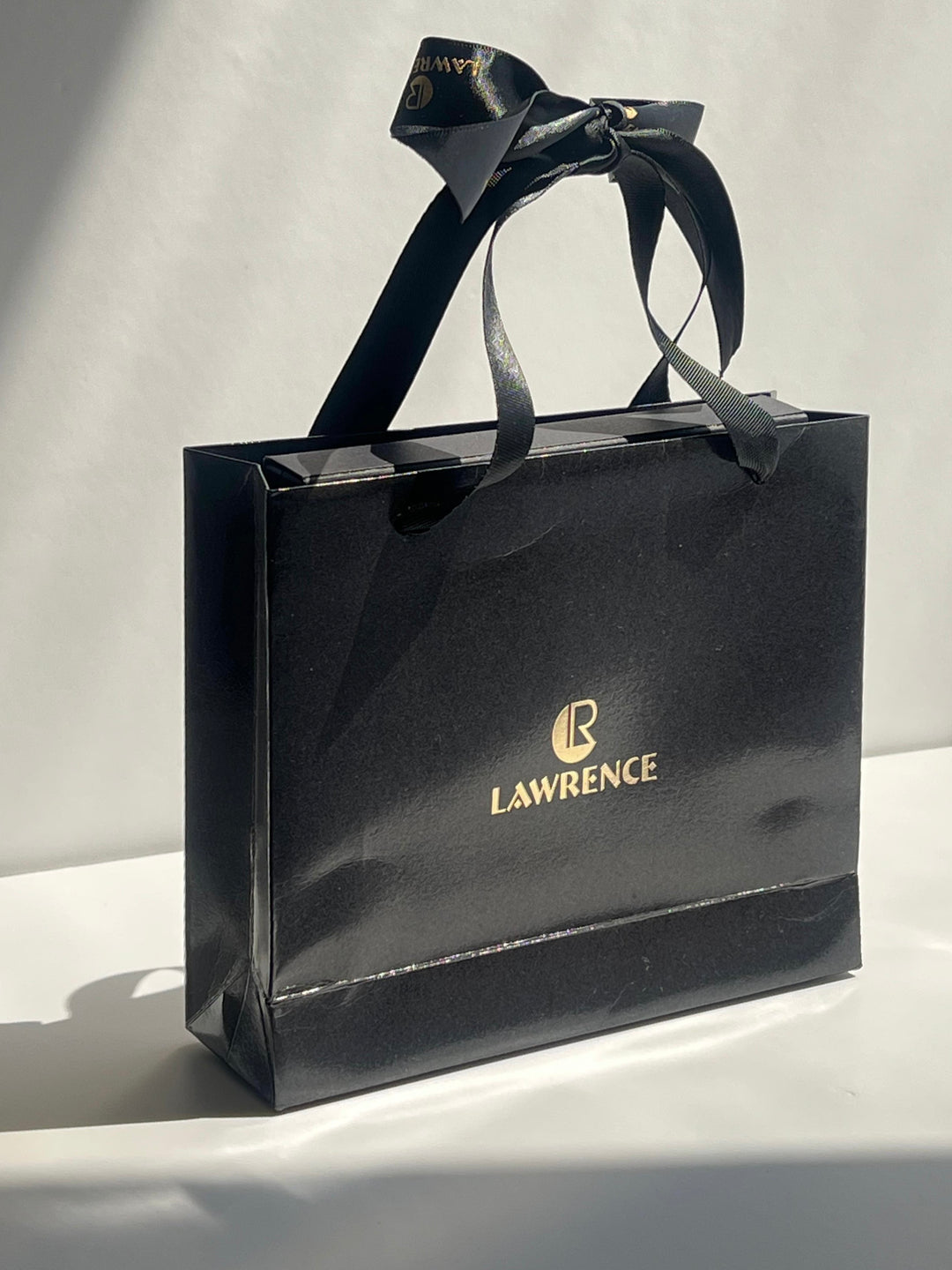 Gift (includes one bag with ribbon)