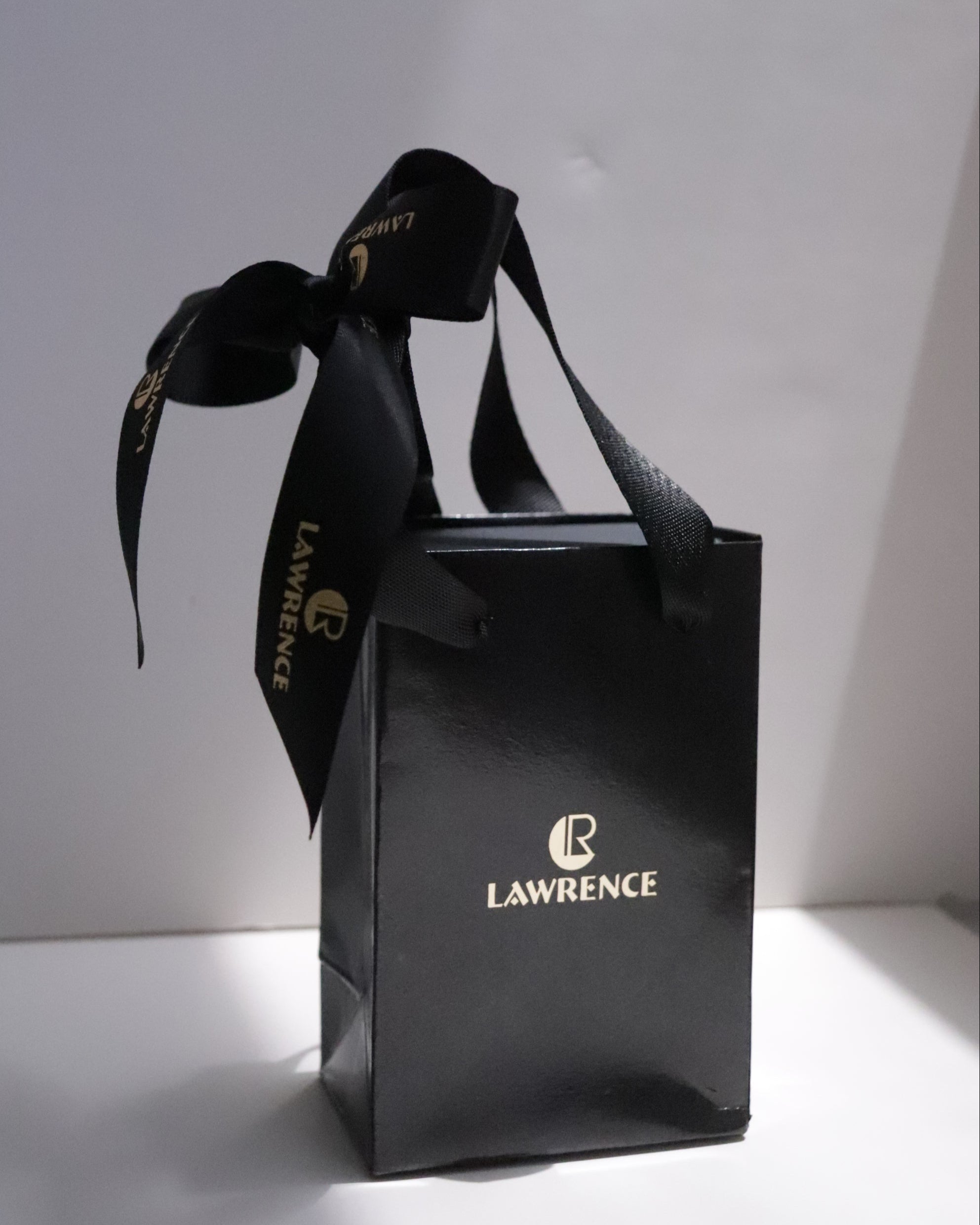 Gift (includes one bag with ribbon)